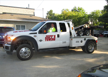 Technician performing auto glass service